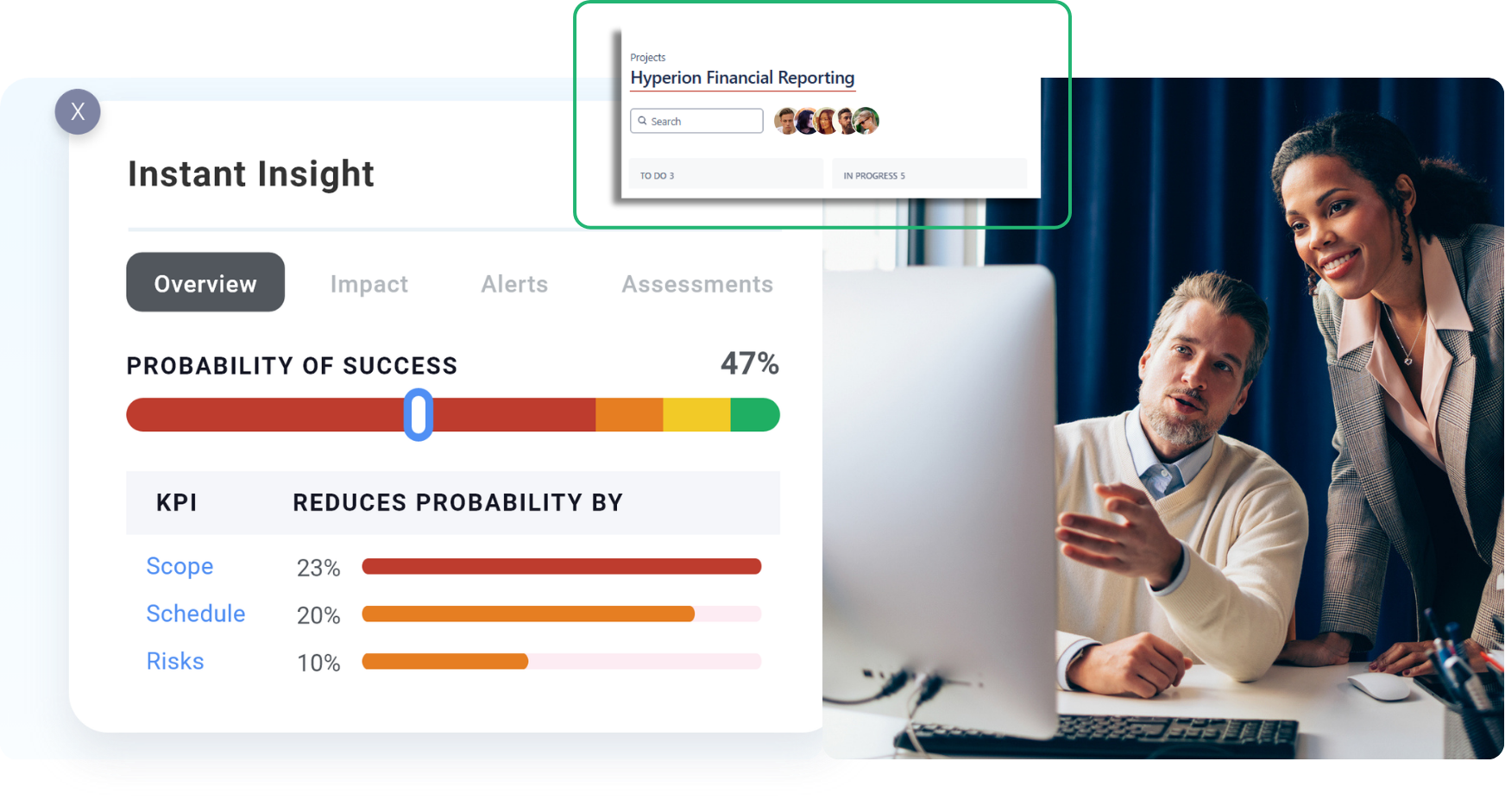 Two colleagues collaborating on a project, looking at computer screen.