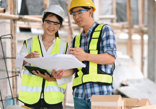 Construction team members in safety gear.