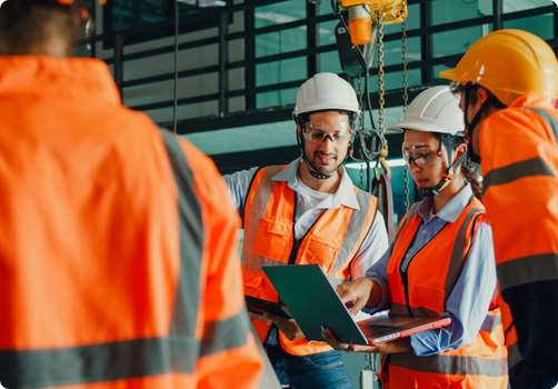 Construction team members in safety gear.