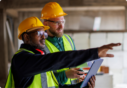 Construction team members in safety gear.