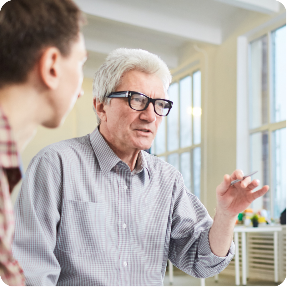 Professional sitting in office setting.