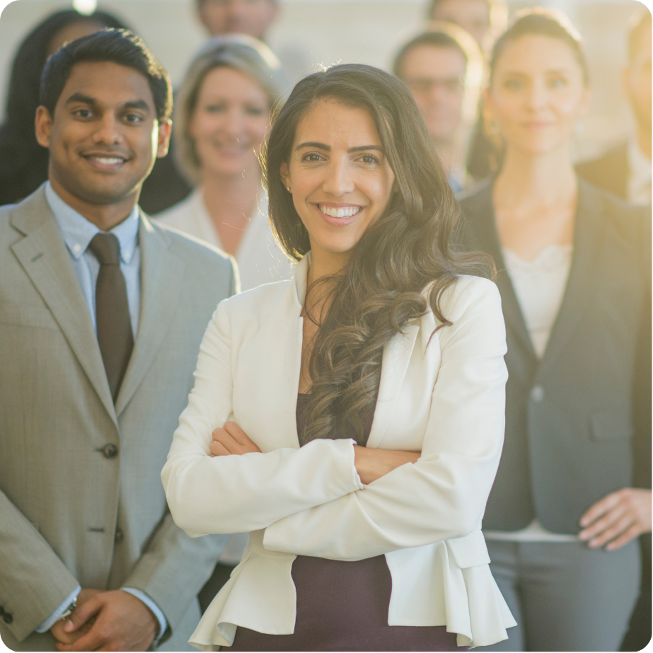 Professional standing in office setting.