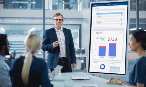 Group of professionals sitting in an office setting.