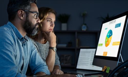 Two professionals in an office setting.