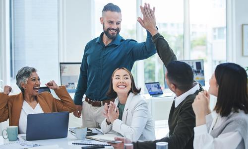 Group of professionals sitting in an office setting.