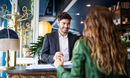 Two professionals in an office setting.
