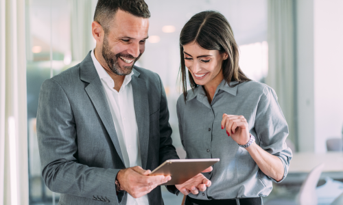 Two professionals in an office setting.