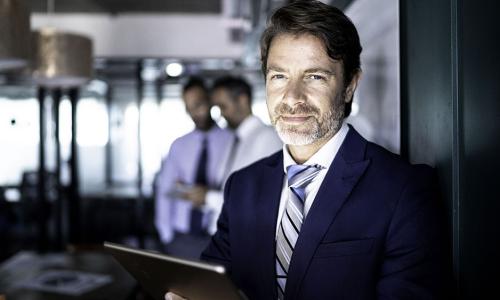 Professionals in an office setting.