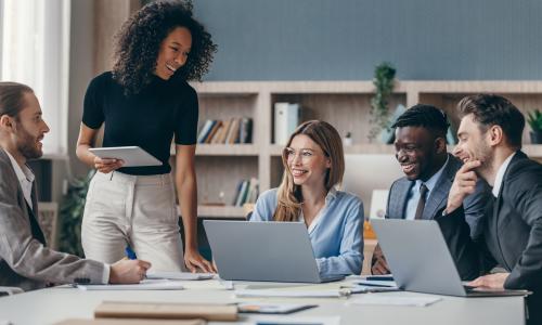 Group of professionals sitting in an office setting.