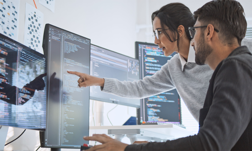 Two professionals in an office setting.