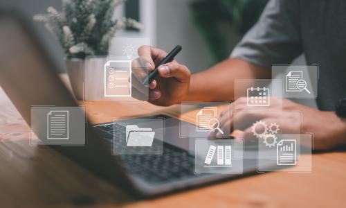 Professional looking at dashboard in office setting.