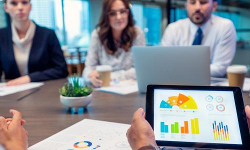 Group of professionals sitting in an office setting.