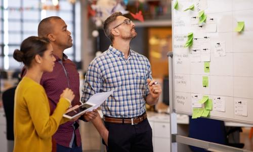 Group of professionals sitting in an office setting.