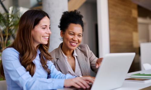 Two professionals in an office setting.