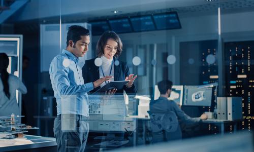 Two professionals in an office setting.