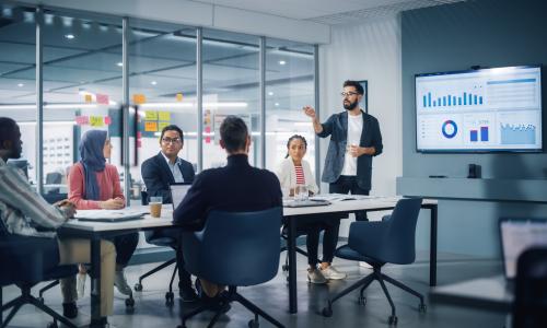 Group of professionals sitting in an office setting.