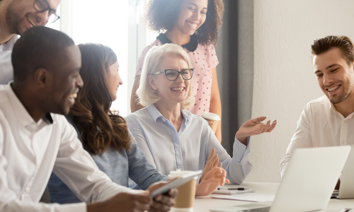 Group of professionals sitting in an office setting.