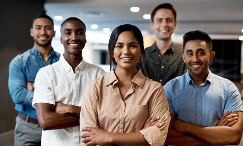 Group of professionals sitting in an office setting.