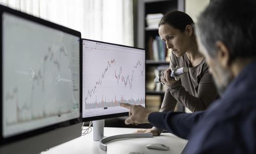 Two professionals in an office setting.