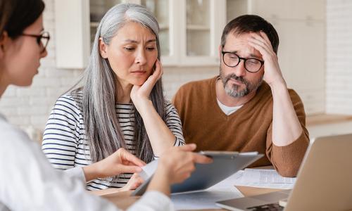 Group of professionals sitting in an office setting.