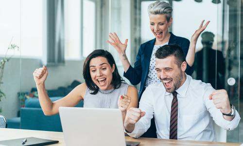 Group of professionals sitting in an office setting.