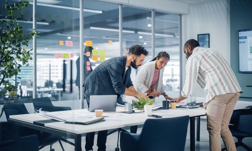 Group of professionals sitting in an office setting.