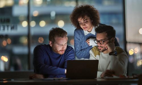 Group of professionals sitting in an office setting.