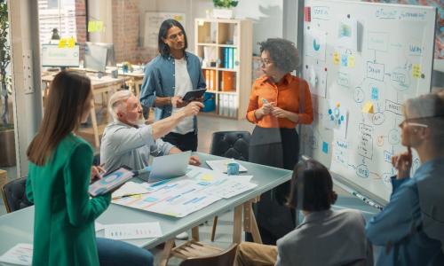 Group of professionals sitting in an office setting.